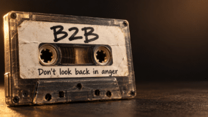 Battered, old fashioned cassette with the words 'B2B' and 'Don't look back in anger' scrawled across it.
